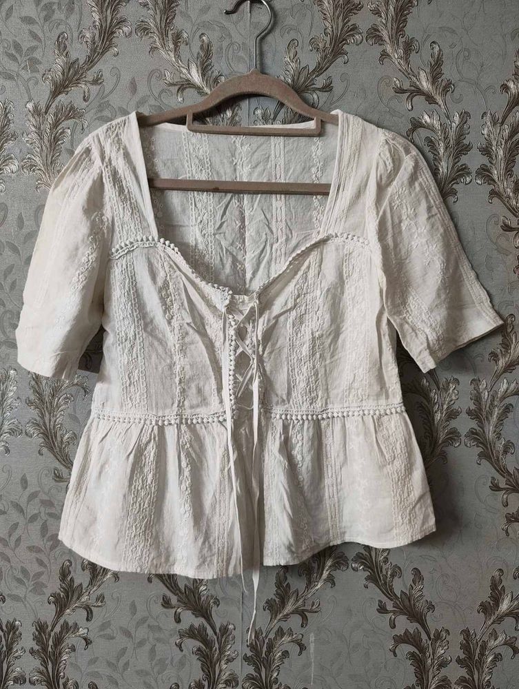 Chic White Lace-Up Peplum Top