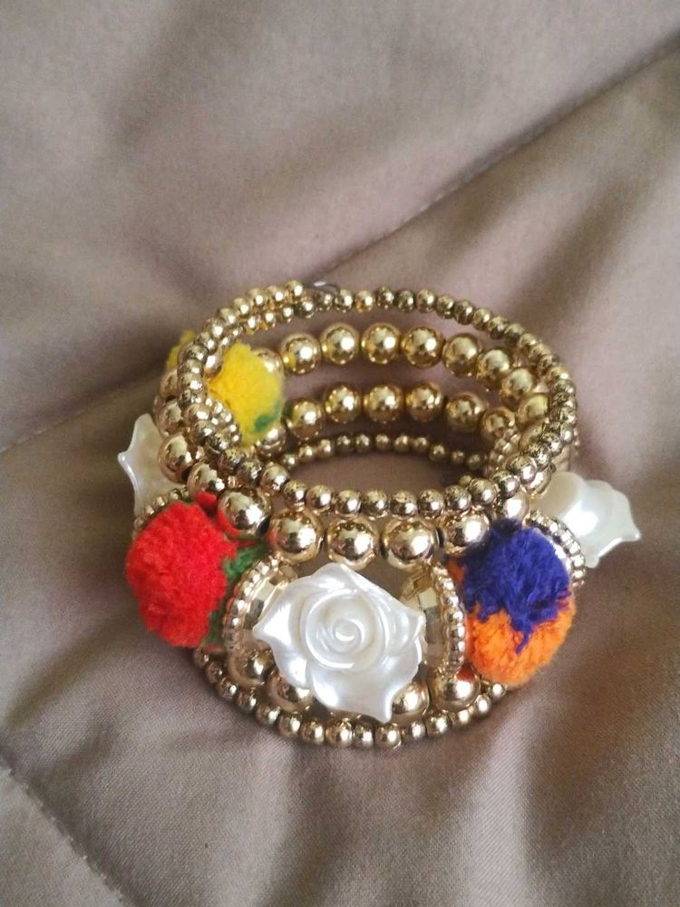 Gold Tone Flower Bangle