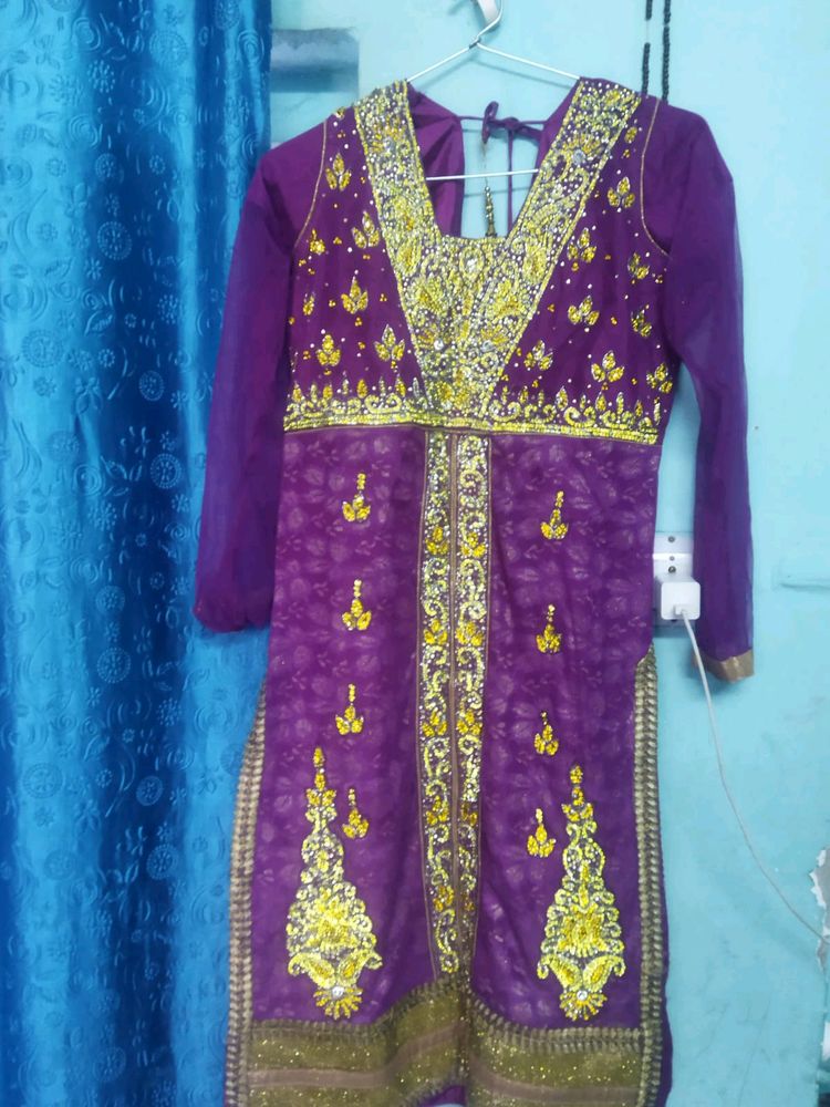 Purple Kurtaa With Zarkan Work On Net. Net Plazo And Dupatta.