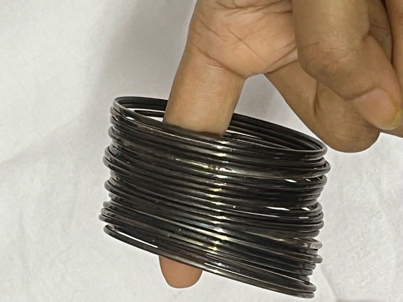 Stack of Elegant Black Bangles