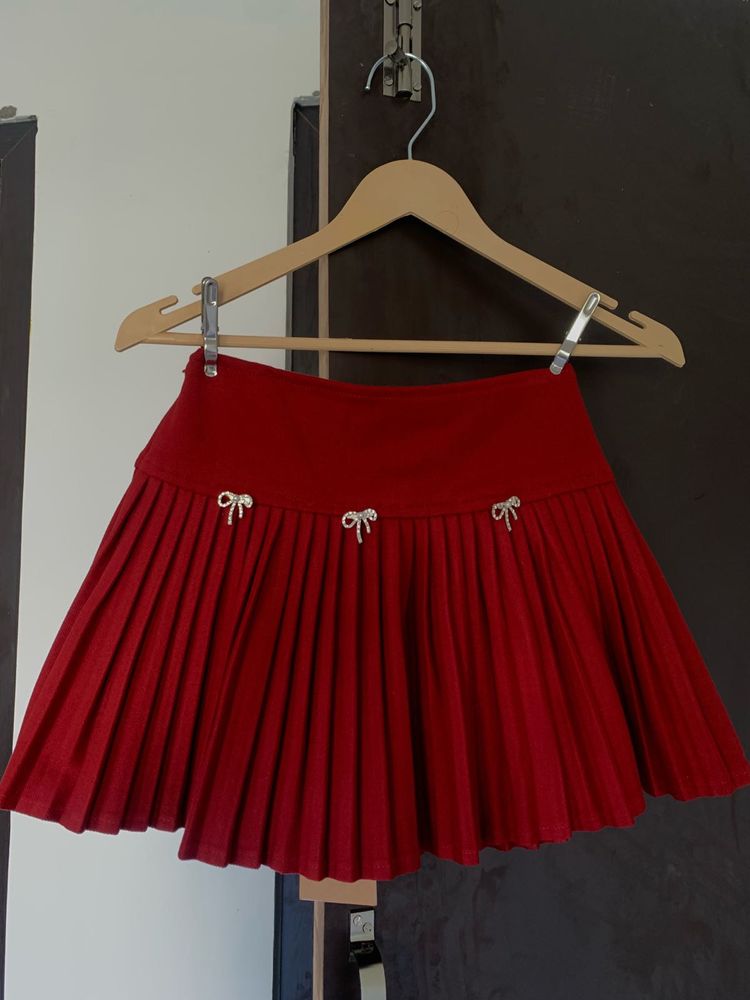 Red Pleated Skirt with Bows