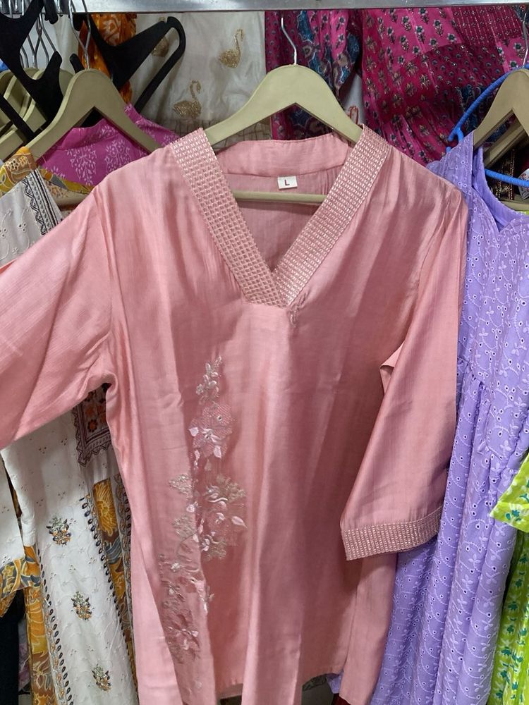 Elegant Pink Kurti with Embroidered Details