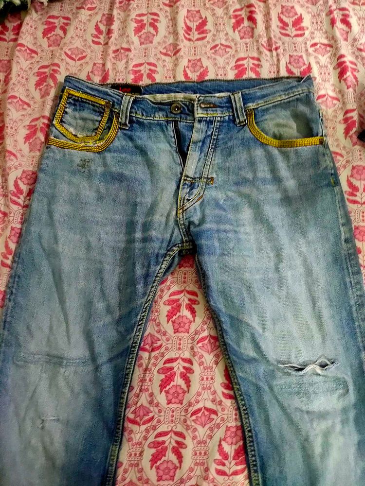 Distressed Denim Jeans