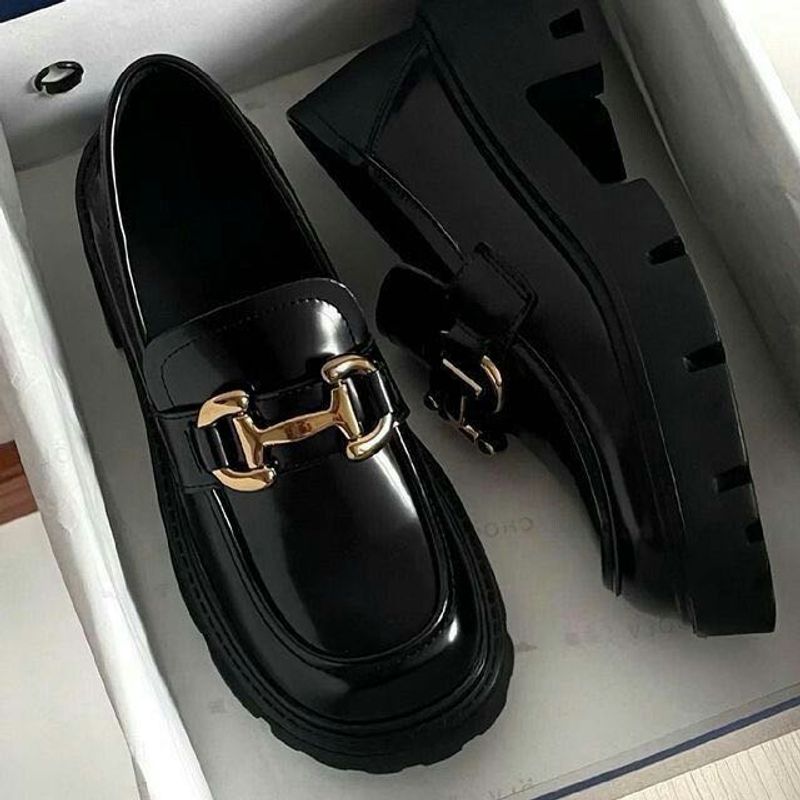 Chic Black Loafers with Gold Buckle
