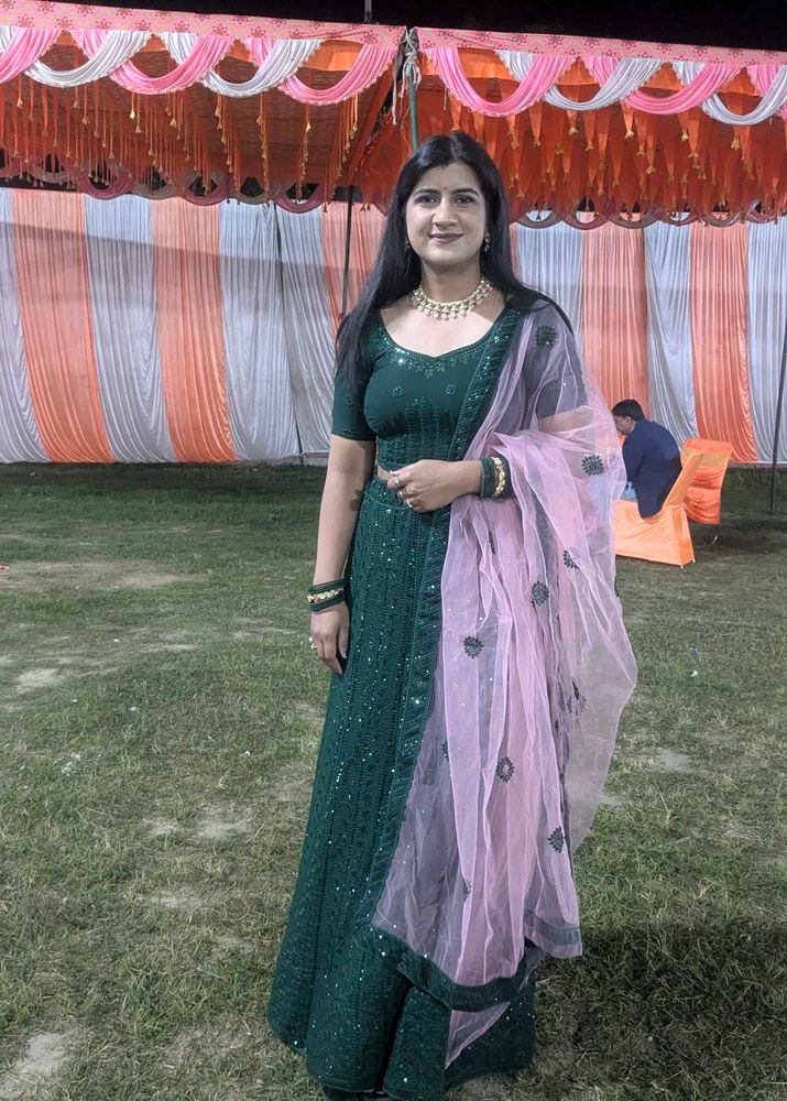 Elegant Green Lehenga Choli with Pink Dupatta