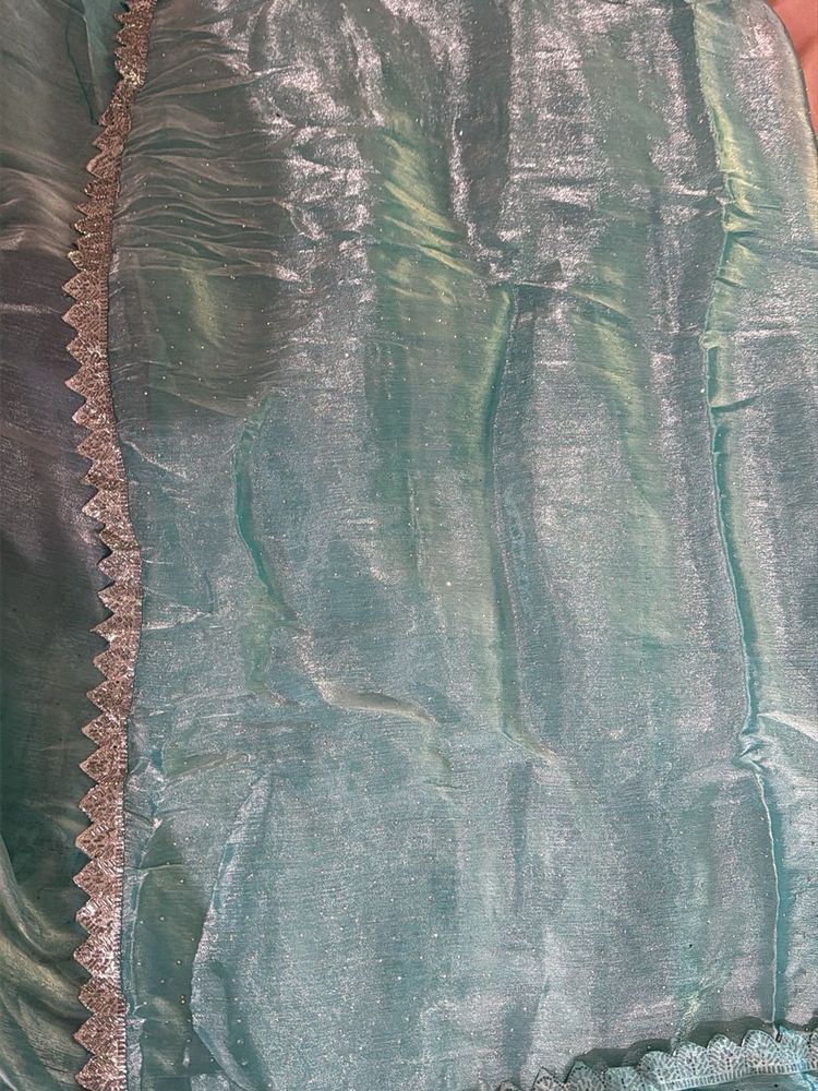 Beautiful Teal Saree with Silver Border