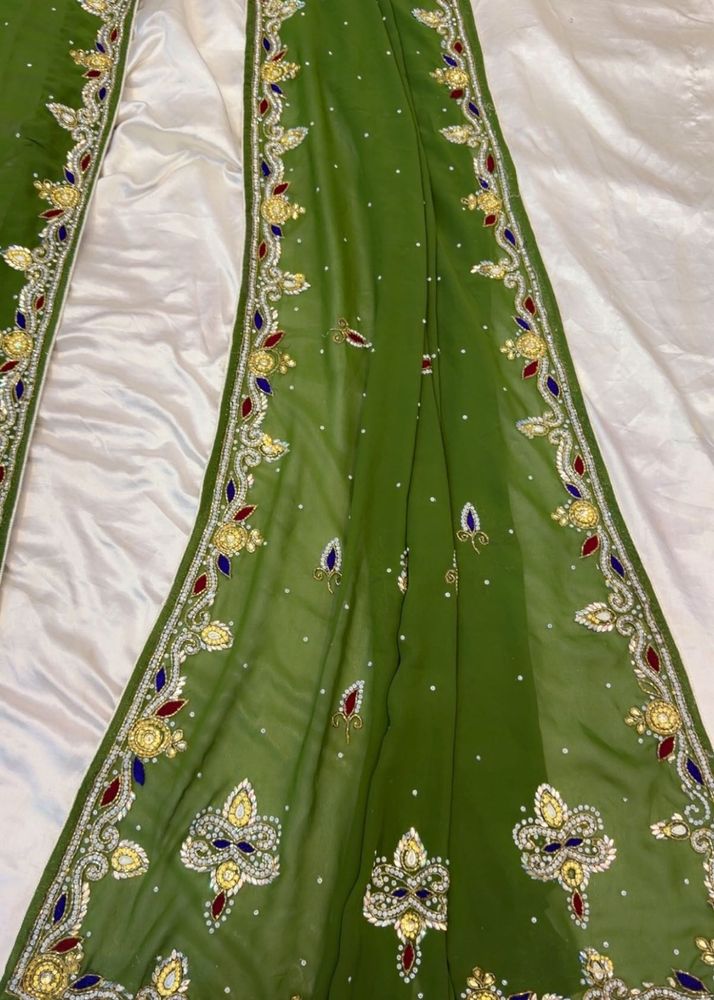 Exquisite Embellished Green Saree