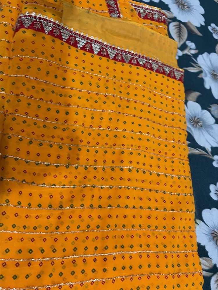 Vibrant Yellow Bandhani Saree with Sequins