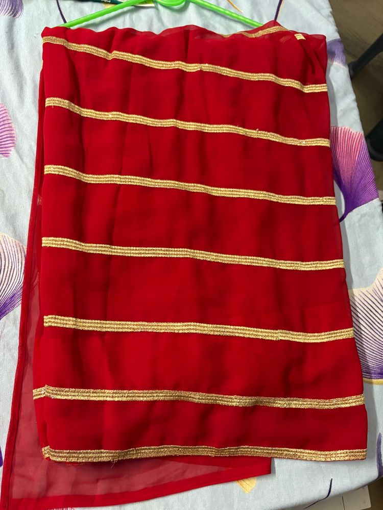 Elegant Red Saree with Gold Border