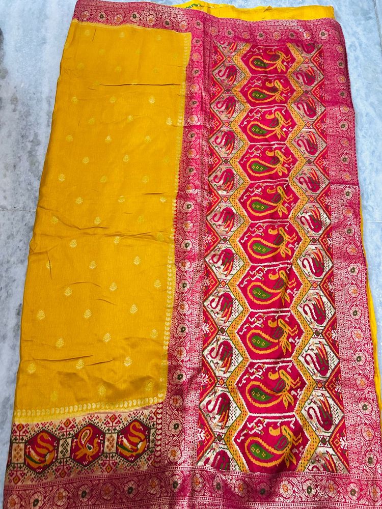 Vibrant Yellow Silk Saree with Intricate Weave