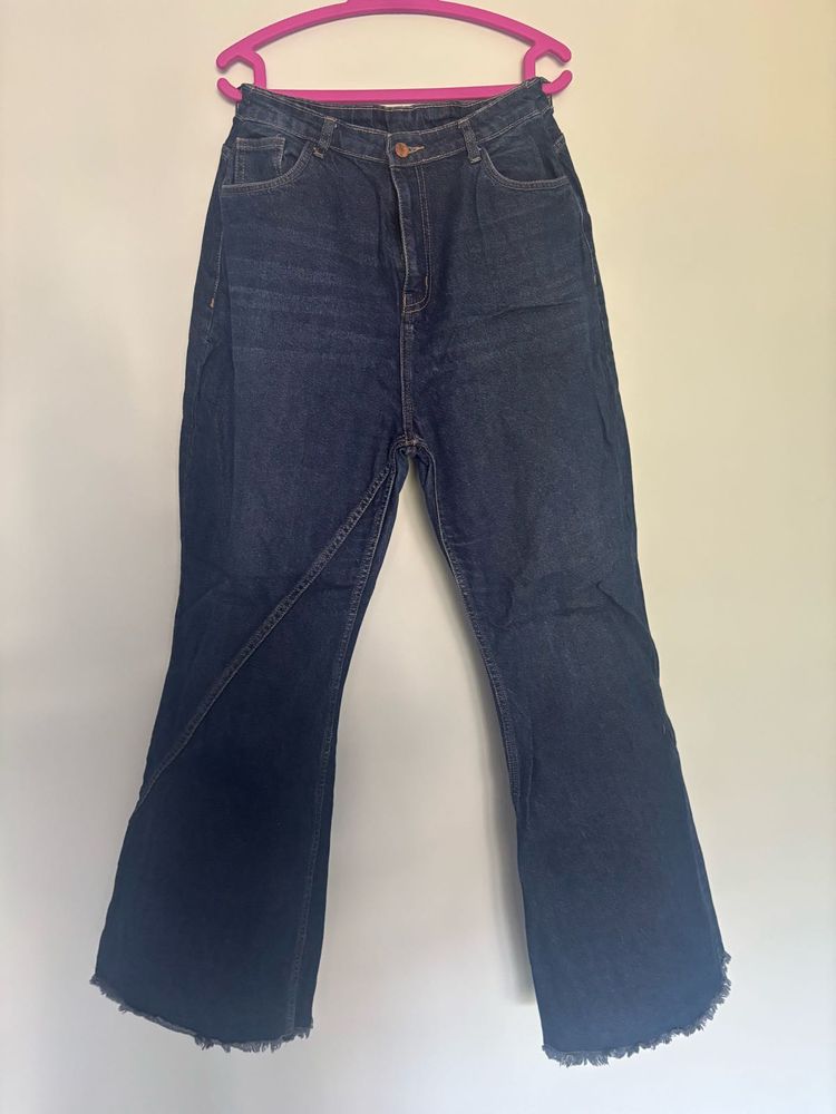Flared Dark Wash Denim Jeans.