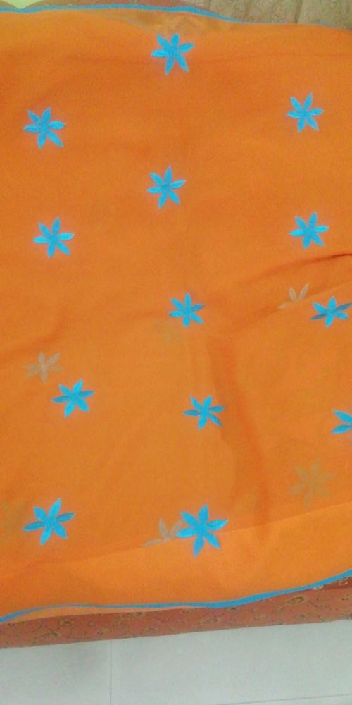 Orange embroidered saree