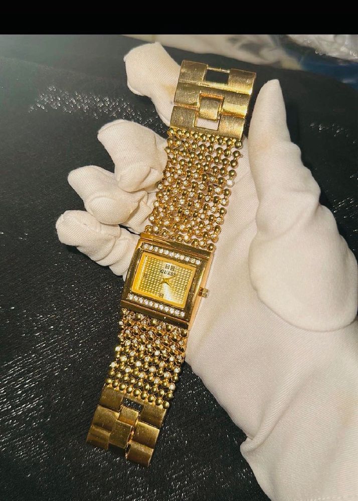Glamorous Gold Tone Crystal Watch