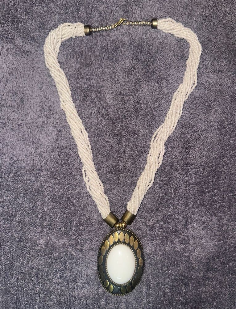 Elegant Beaded Necklace with Statement Pendant