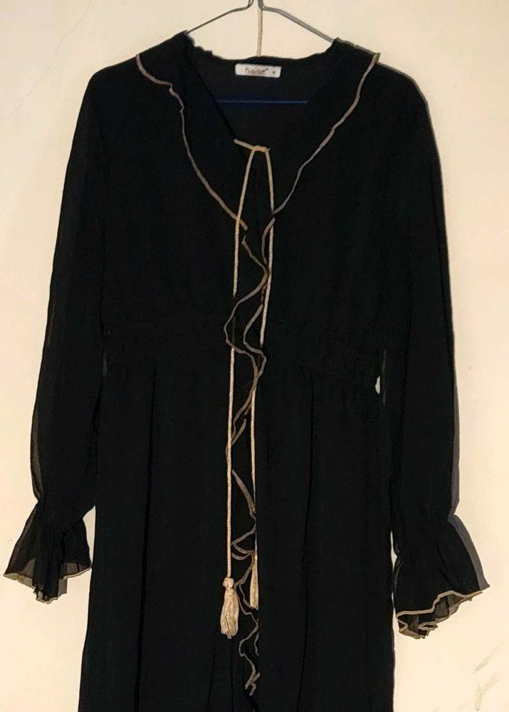 Black Abaya with Cream-colored Ruffle Trim