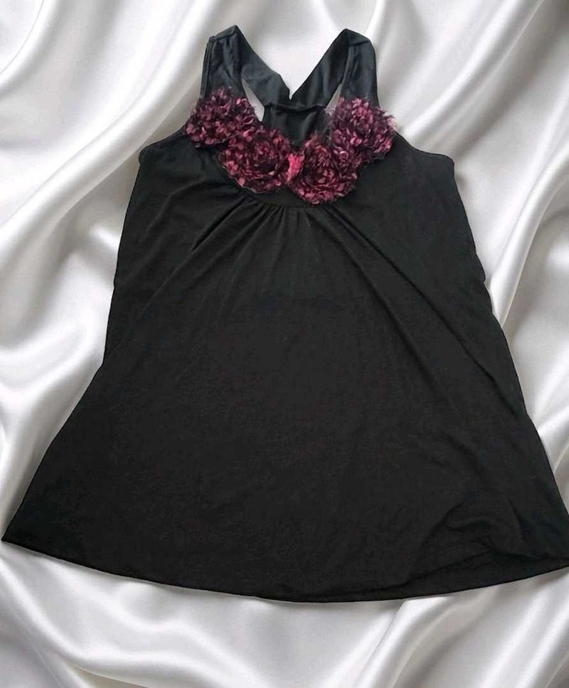 Chic Black Tank Top with Floral Embellishment