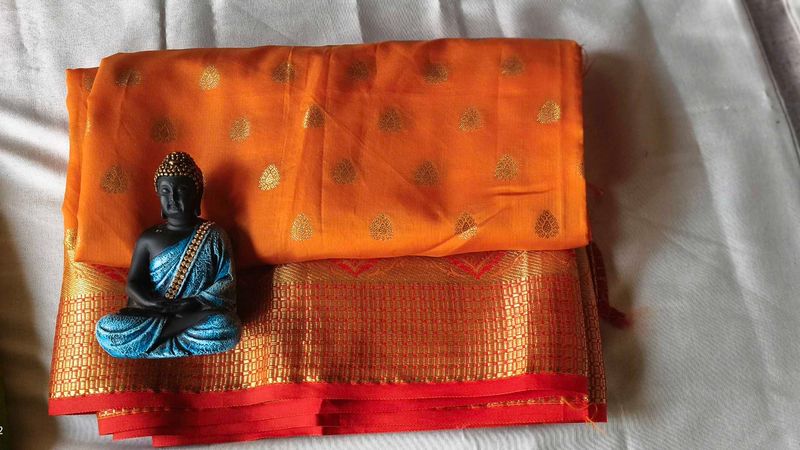 Elegant Orange Silk Saree with Golden Zari