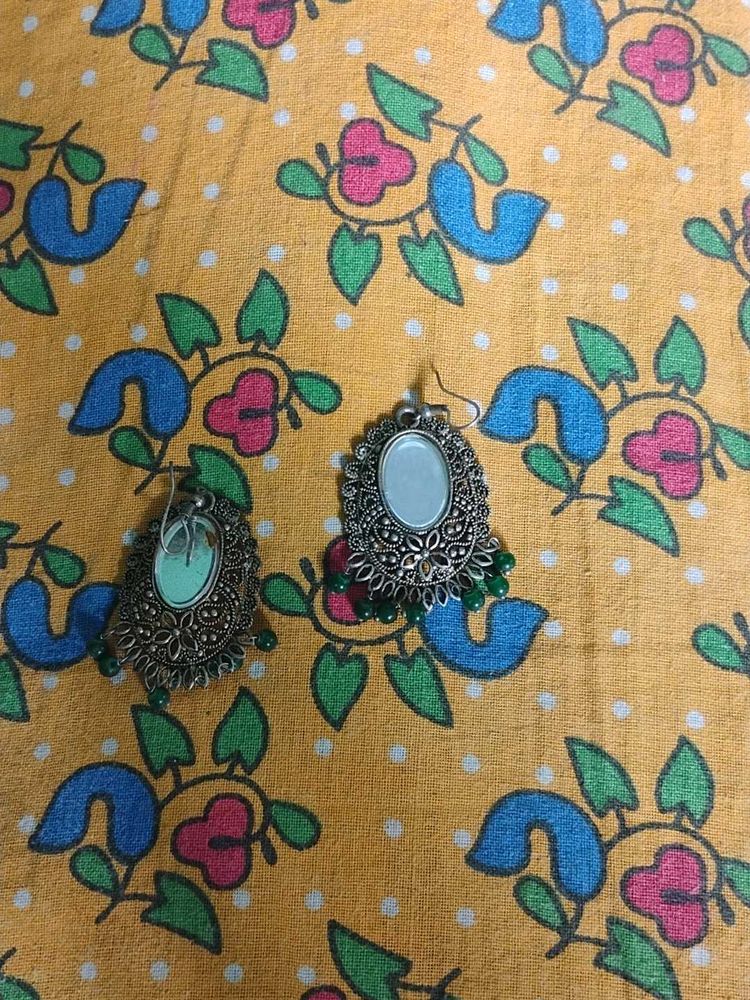 Elegant Ethnic Earrings with Green Accents