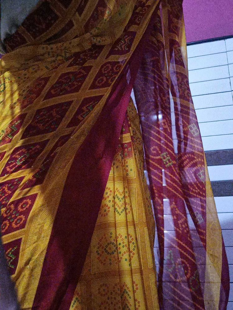 red and yellow saree