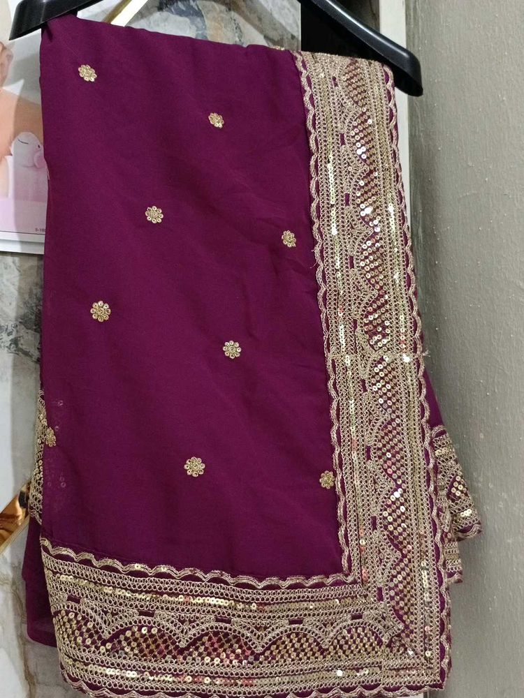 Elegant Purple  blause and Saree with Gold Embelli