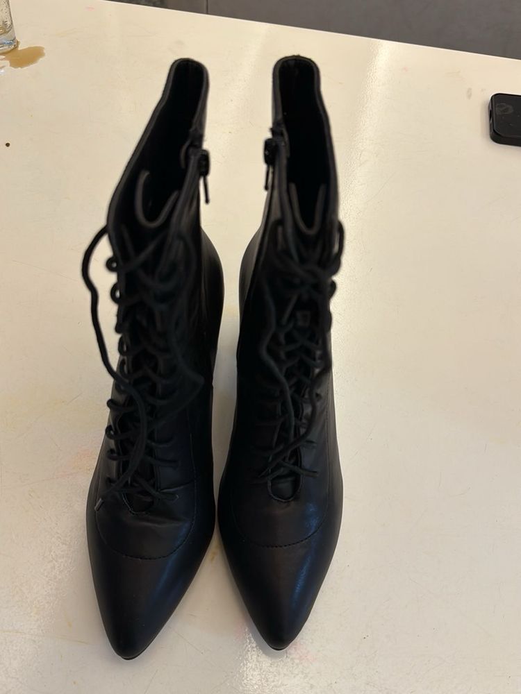 Chic Black Lace-Up Heeled Boots