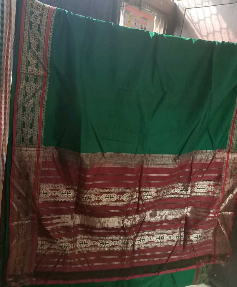 Elegant Green Saree with Red Border
