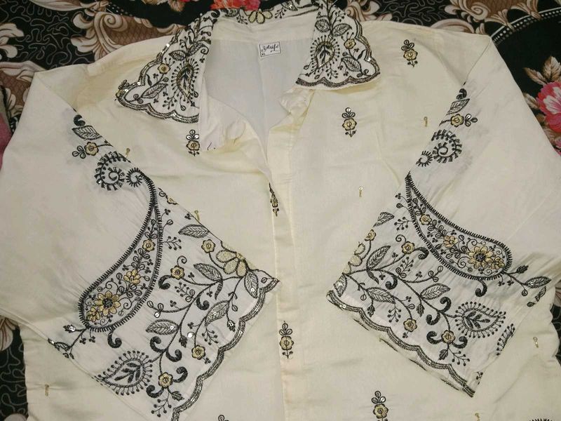 Cream Kurta with Intricate Embroidery
