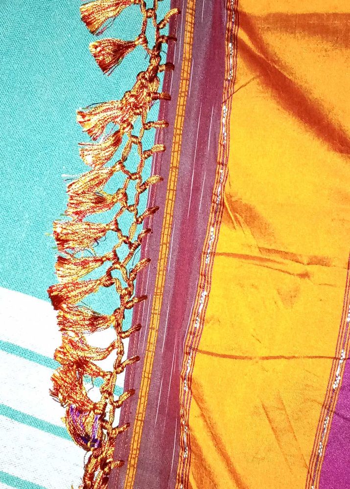 Vibrant Silk Saree with Tassel Border