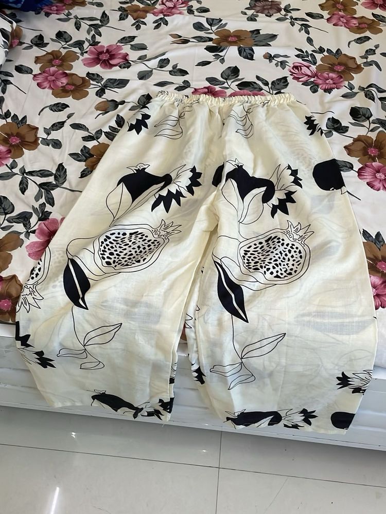Cream Palazzos with Pomegranate Print