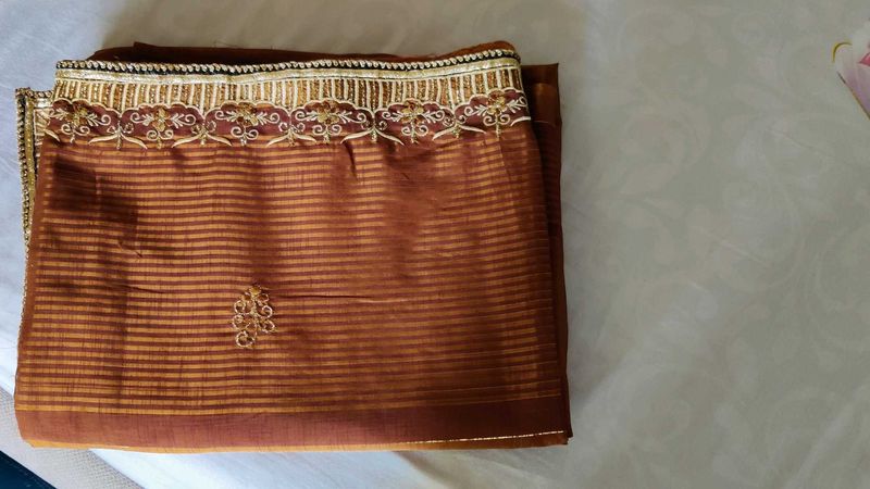 Elegant Brown Striped Saree with Gold Embroidery