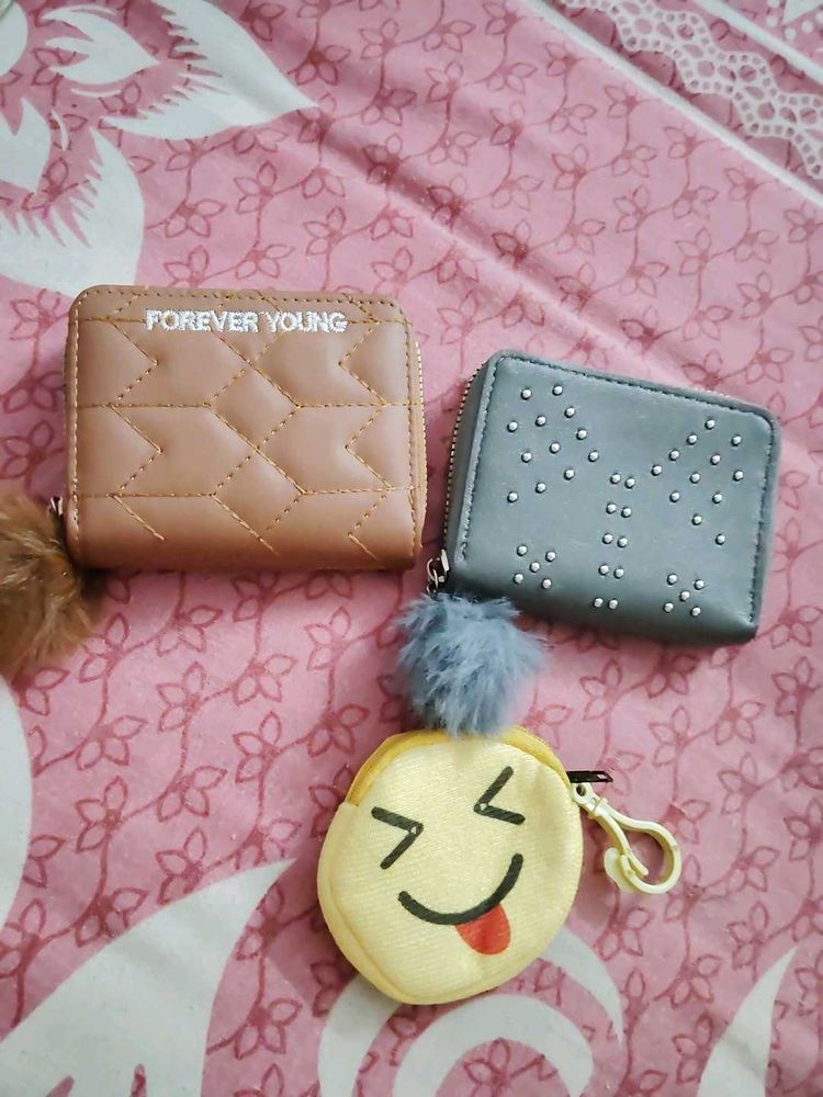 25.Cute Wallets with Pom Poms