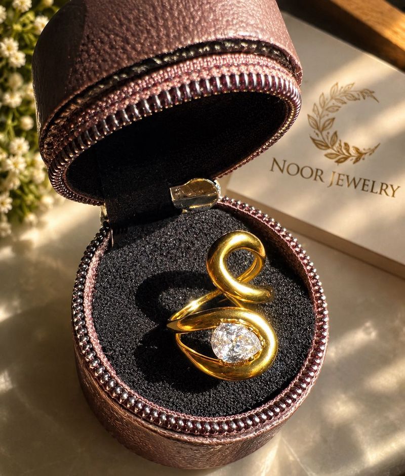 Elegant Gold Ring with Diamond Accent