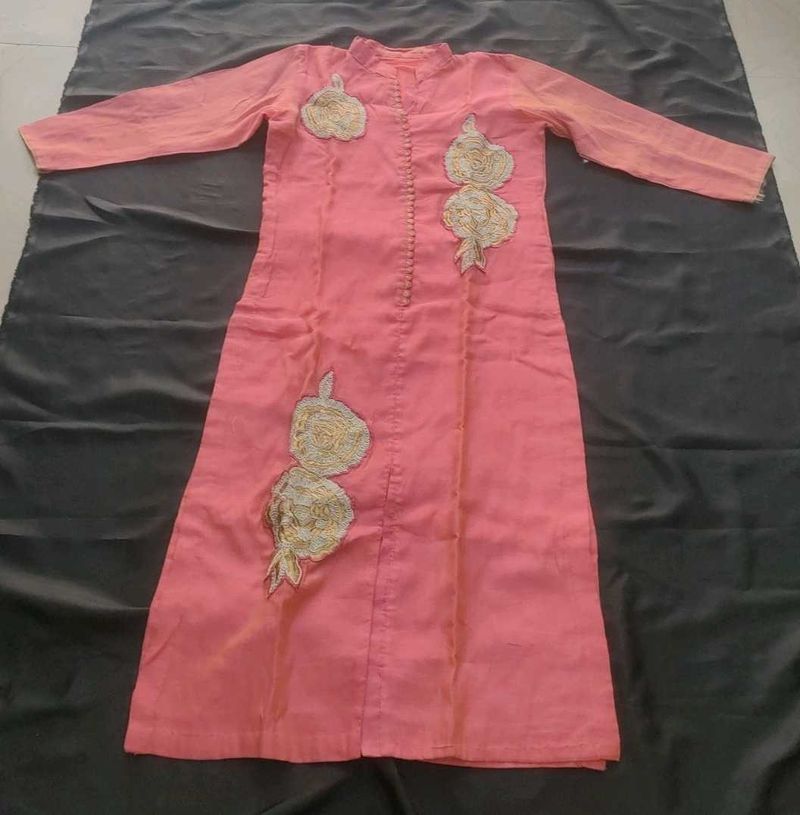 Elegant Pink Kurta with Embroidered Motifs