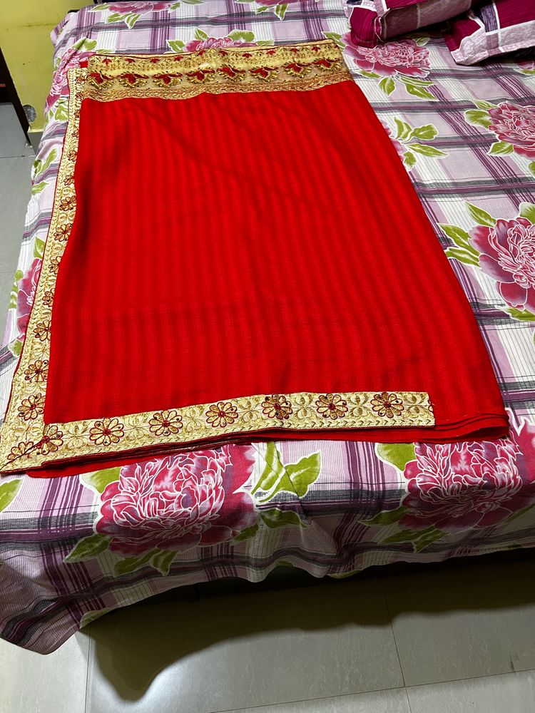 Elegant Red Saree with Golden Border