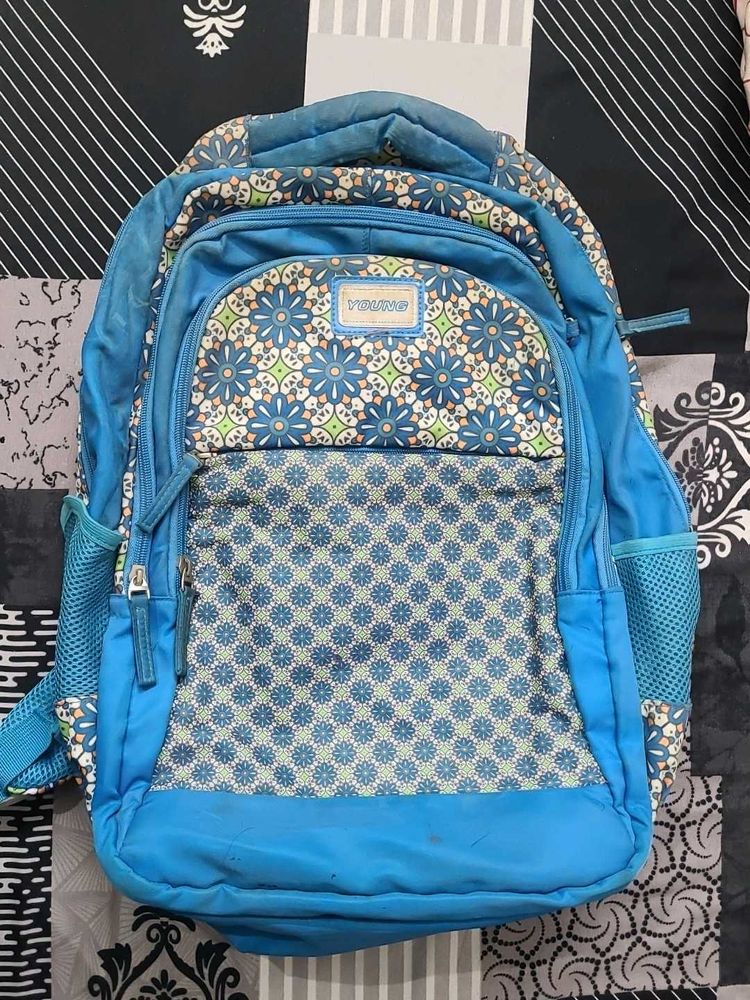 Blue Backpack with Floral Pattern