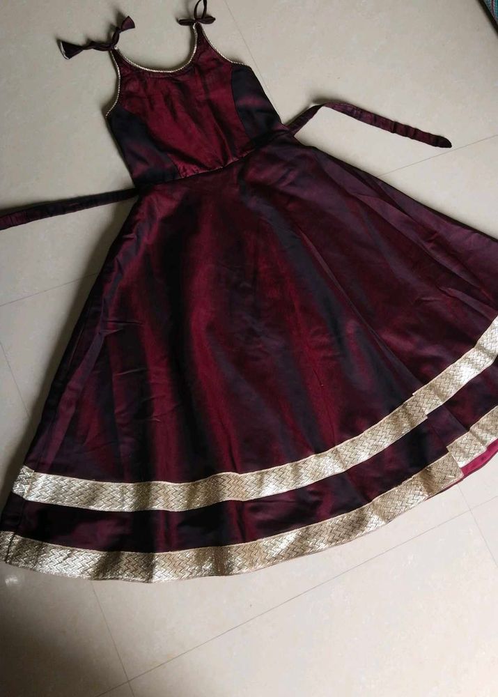 Maroon gown with Gold Border