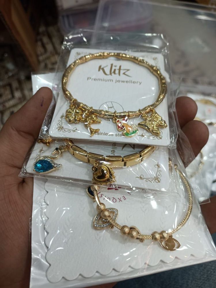 Gold Tone Charm Bracelets