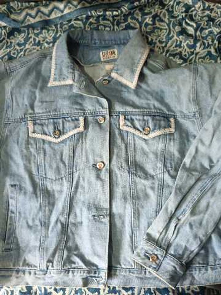 Light Wash Denim Jacket with White Trim