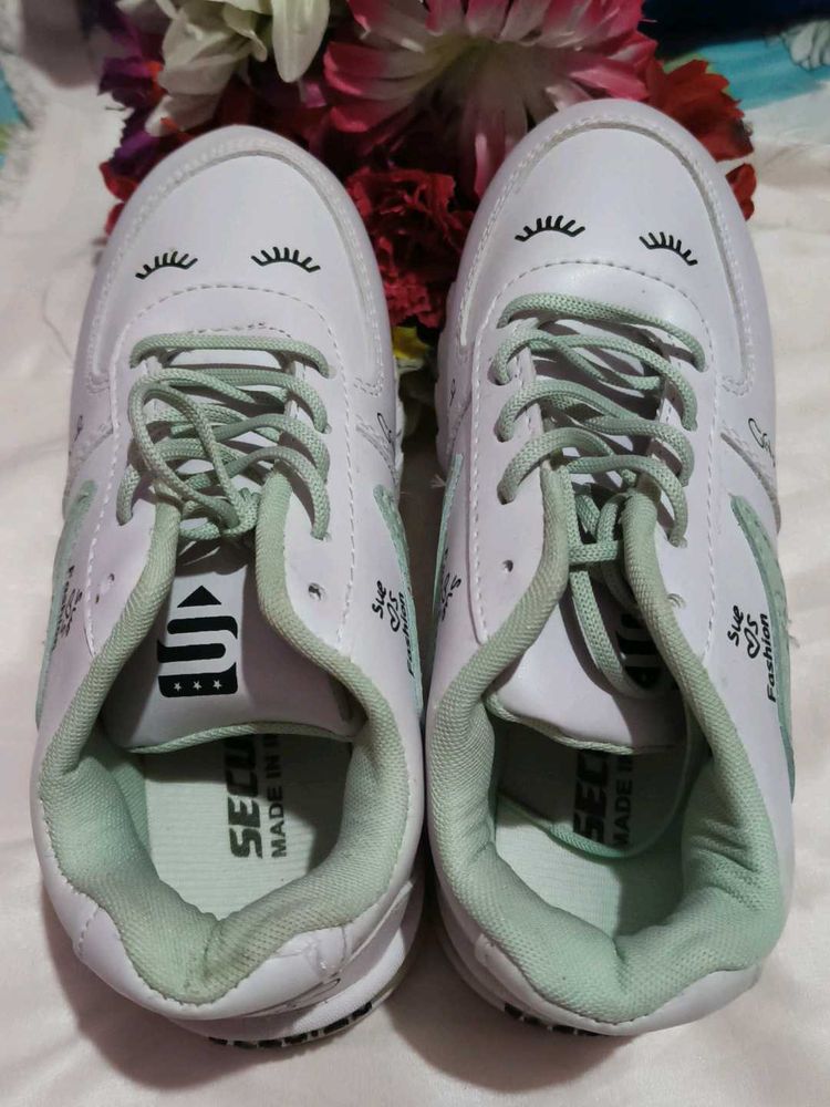 White Sneakers with Cute Eyelash Design