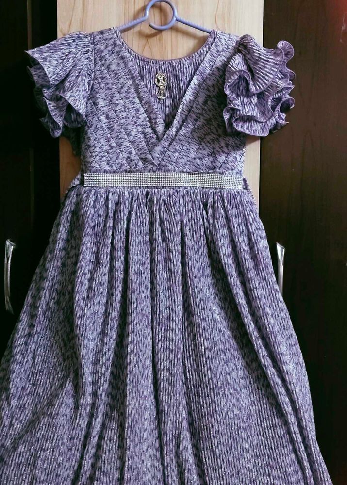 Elegant Purple Pleated Gown with Embellished Belt