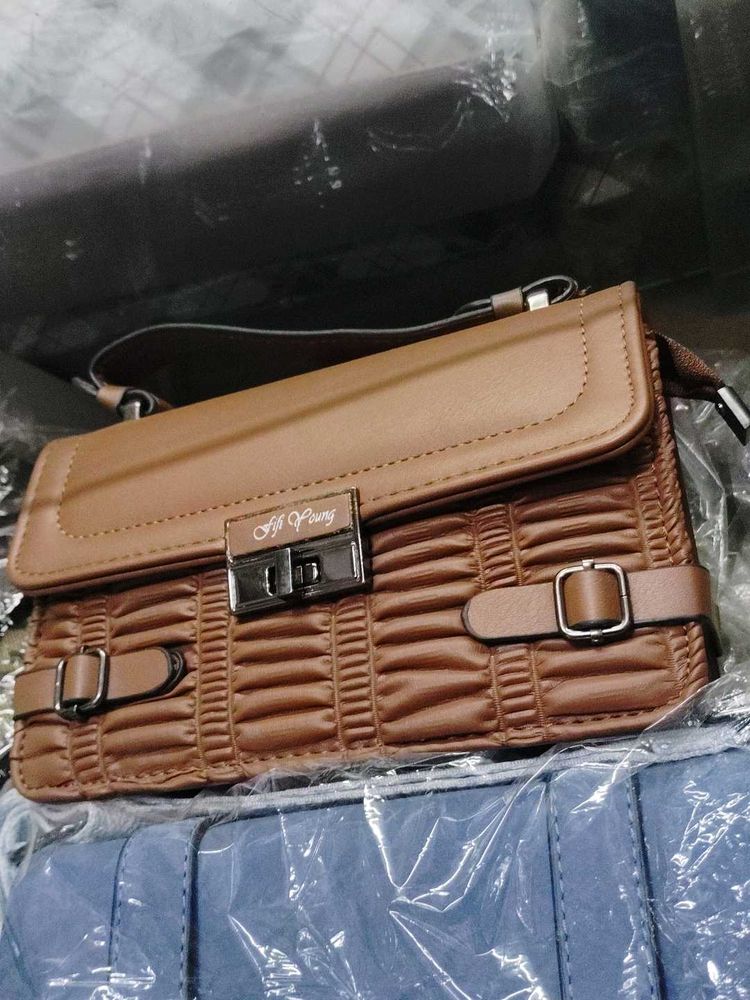 Stylish Brown Handbag with siling belt
