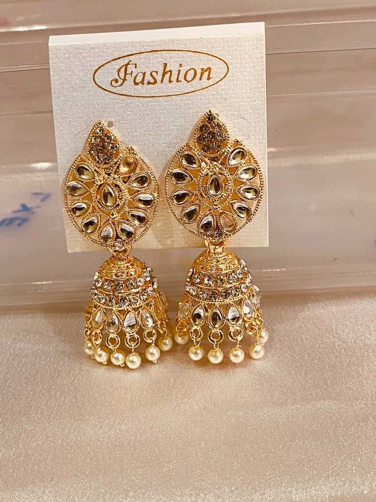 Elegant Gold Jhumka Earrings with Pearls