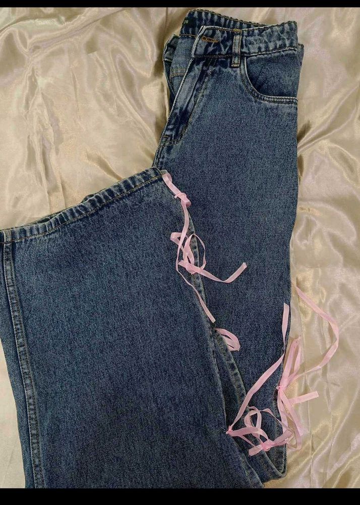 Blue Jeans with Pink Ribbon Detail