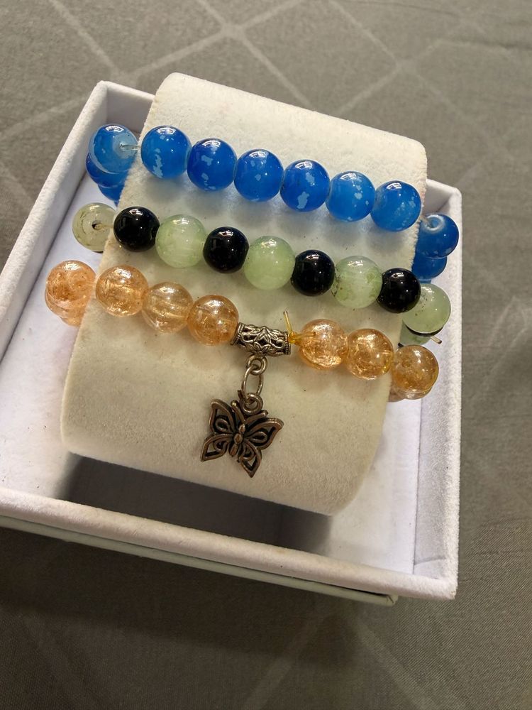 Set of 4 Beaded Bracelets with Charm