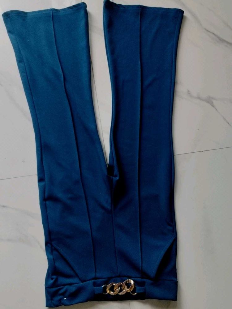 Stylish Teal Flared Pants with Chain Detail