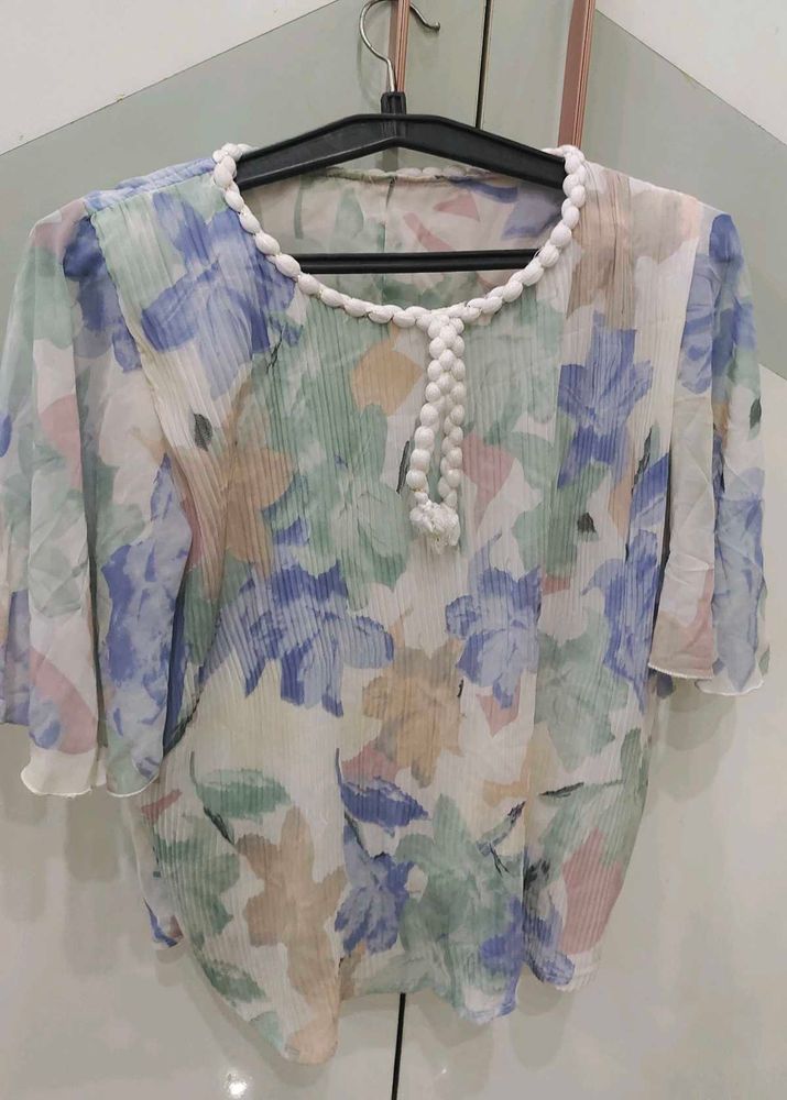 Floral Print Blouse with unique neckline detail