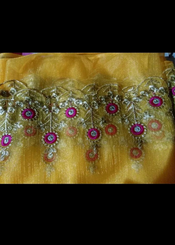Vibrant Yellow Saree with Intricate Embroidery