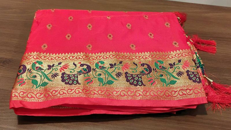 Vibrant Pink Saree with Peacock Border