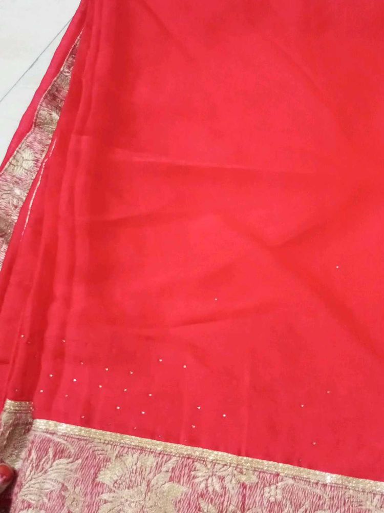 Red Saree with Golden Blouse
