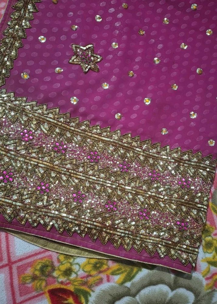 Embellished Fuchsia Saree with Gold Accents